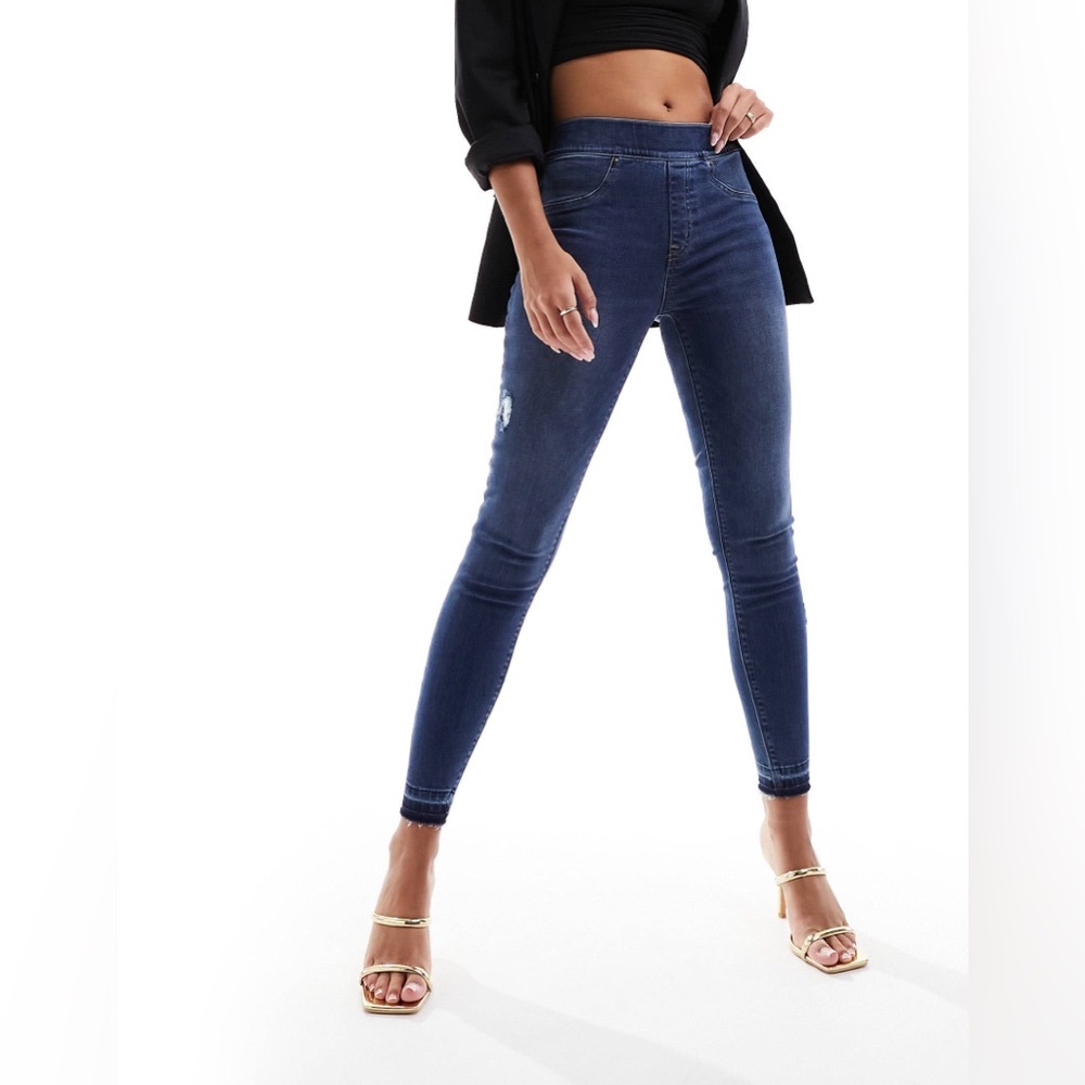 SPANX Shape and Lift Distressed Skinny Jeans with Frayed Hem in Medium Blue